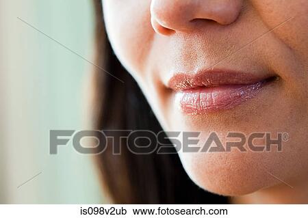 Stock Image - Close up on female mouth. Fotosearch