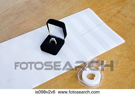 Stock Photograph - Engagement ring gift. Fotosearch