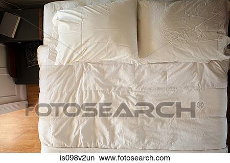 Overhead view of double bed View Large Photo Image Picture - Overhead view of double bed. Fotosearch