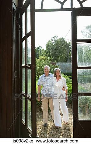 Mature couple by french doors View Large Photo Image Stock Photography - Mature couple by french doors. Fotosearch