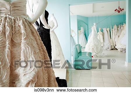 Selection of wedding dresses in boutique View Large Photo Image Picture - Selection of wedding dresses in boutique. Fotosearch