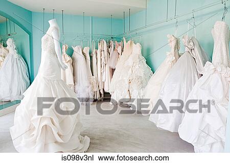 Selection of wedding dresses in boutique View Large Photo Image Stock Image - Selection of wedding dresses in boutique. Fotosearch