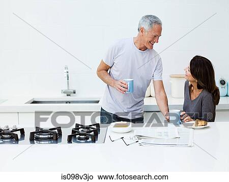Picture - Mature couple having breakfast. Fotosearch