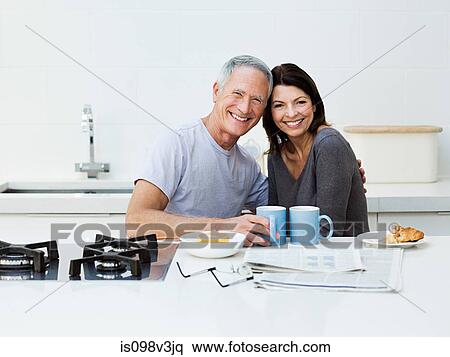 Mature couple having breakfast View Large Photo Image Stock Photography - Mature couple having breakfast. Fotosearch