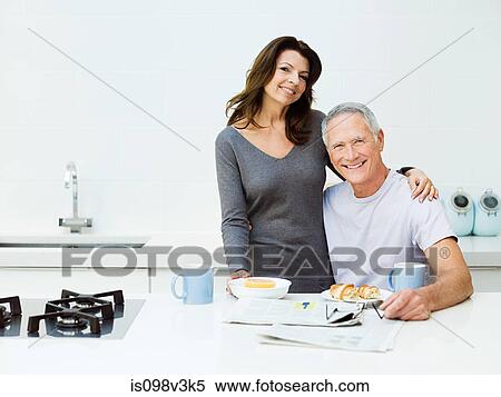 Mature couple having breakfast View Large Photo Image Stock Photography - Mature couple having breakfast. Fotosearch