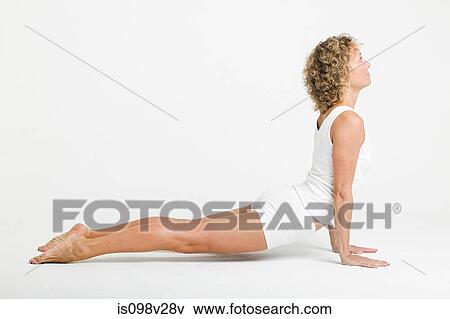 Stock Photo - Flexible woman stretching. Fotosearch