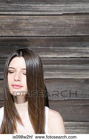 Serene woman with eyes closed View Large Photo Image Stock Image - Serene woman with eyes closed. Fotosearch