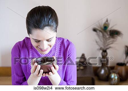 Picture - Women drinking herbal tea. Fotosearch