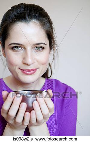 Stock Photograph - Women drinking herbal tea. Fotosearch