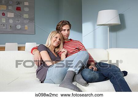 Stock Image - Couple watching television. Fotosearch