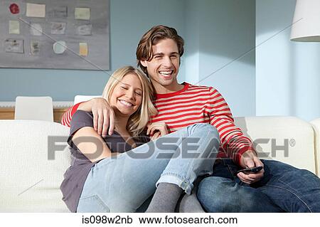 Couple watching television View Large Photo Image Stock Image - Couple watching television. Fotosearch