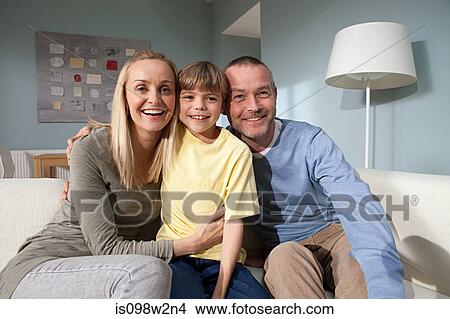 Family portrait in living room View Large Photo Image Picture - Family portrait in living room. Fotosearch