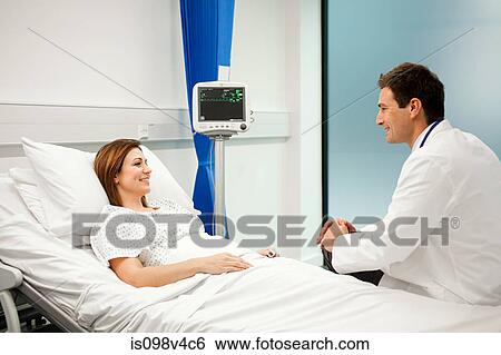 Stock Photograph - Female patient with doctor. Fotosearch