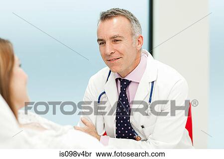 Female patient with doctor View Large Photo Image Stock Photography - Female patient with doctor. Fotosearch