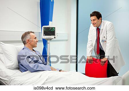 Stock Image - Male patient with doctor. Fotosearch