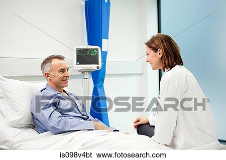 Stock Photograph - Male patient with doctor. Fotosearch