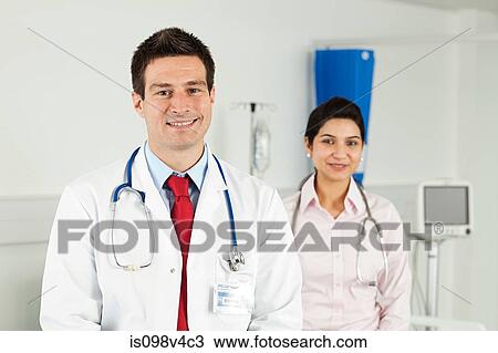 Portrait of male and female doctors View Large Photo Image Stock Image - Portrait of male and female doctors. Fotosearch