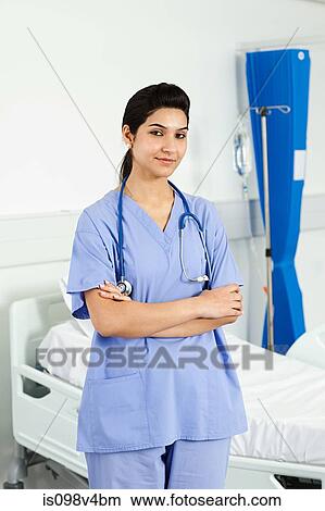 Picture - Portrait of mid adult female doctor. Fotosearch