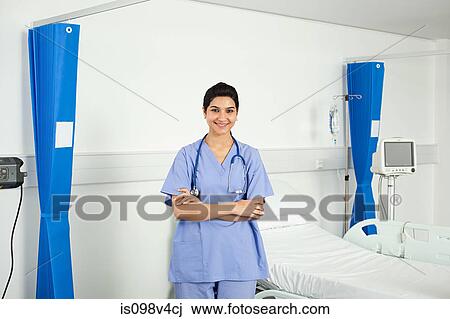 Portrait of mid adult female doctor View Large Photo Image Stock Image - Portrait of mid adult female doctor. Fotosearch