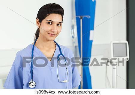 Stock Photo - Portrait of mid adult female doctor. Fotosearch