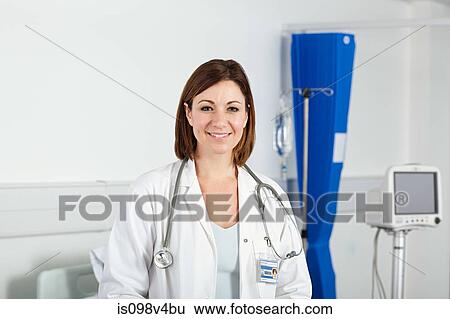 Stock Photograph - Portrait of mid adult female doctor. Fotosearch