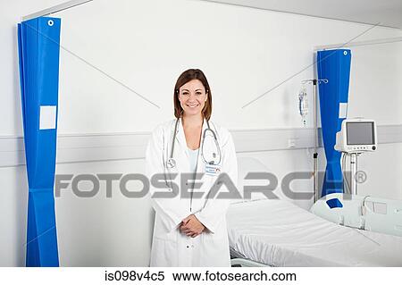Portrait of mid adult female doctor View Large Photo Image Stock Photography - Portrait of mid adult female doctor. Fotosearch