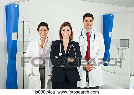 Stock Image - Portrait of three doctors. Fotosearch
