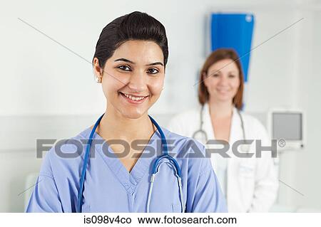 Portrait of two female doctors View Large Photo Image Picture - Portrait of two female doctors. Fotosearch
