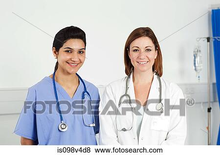 Stock Photo - Portrait of two female doctors. Fotosearch
