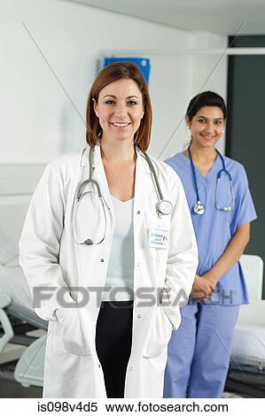 Stock Photography - Portrait of two female doctors. Fotosearch