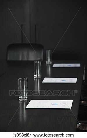 Conference table with drinking glasses and documents View Large Photo Image Stock Photography - Conference table with drinking glasses and documents. Fotosearch