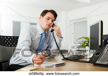 Office worker on telephone call View Large Photo Image Stock Photography - Office worker on telephone call. Fotosearch