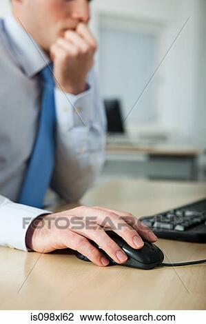 Office worker using computer View Large Photo Image Stock Image - Office worker using computer. Fotosearch