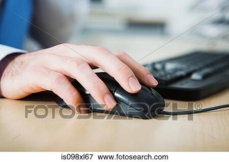 Office worker using computer View Large Photo Image Stock Photo - Office worker using computer. Fotosearch