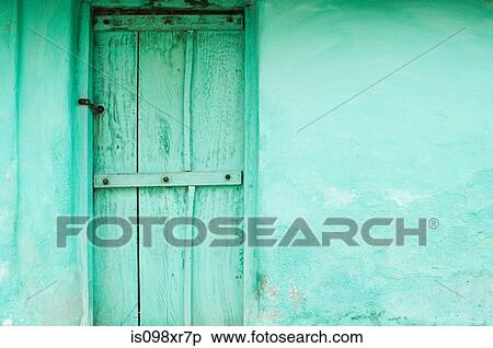 Green wooden door and wall of village house near Mysore, Karnataka View Large Photo Image Stock Photography - Green wooden door and wall of village house near Mysore, Karnataka. Fotosearch