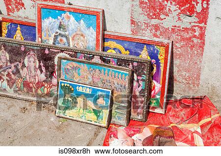 Stock Image - Hindu paintings in frames at temple, Trichy, Tamil Nadu. Fotosearch