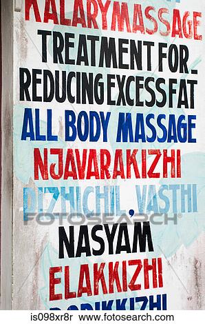 Massage advert on wall in Keralan backwaters View Large Photo Image Stock Photography - Massage advert on wall in Keralan backwaters. Fotosearch