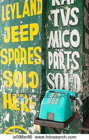 Stock Photograph - Public telephone in high street, Ooty, Nilgiri Hills, Kerala. Fotosearch