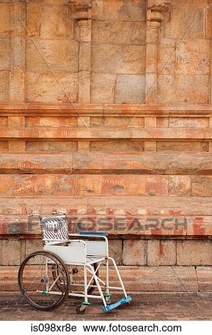 Stock Image - Public use wheelchair, Tanjore temple, Tamil Nadu. Fotosearch
