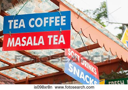 Picture - Tea, coffee, masala tea signs on stall in Cochin, Kerala. Fotosearch