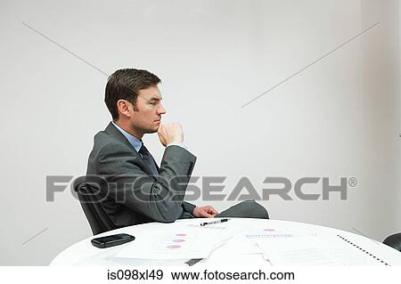 Businessman in office View Large Photo Image Stock Photo - Businessman in office. Fotosearch