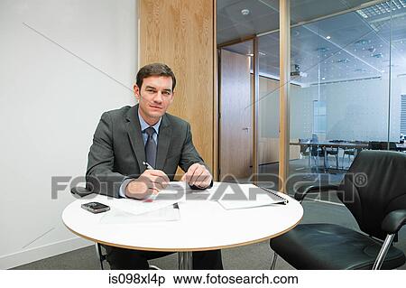 Businessman in office View Large Photo Image Stock Photography - Businessman in office. Fotosearch