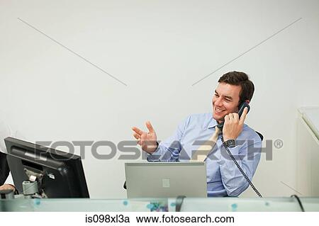Businessman on the phone View Large Photo Image Stock Image - Businessman on the phone. Fotosearch