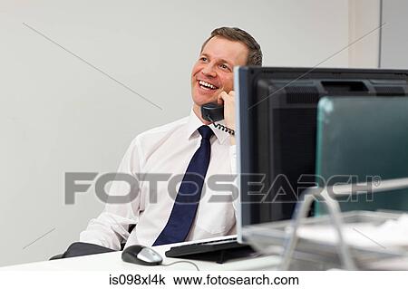 Businessman on the phone View Large Photo Image Stock Image - Businessman on the phone. Fotosearch