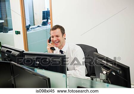 Businessman on the phone View Large Photo Image Stock Photography - Businessman on the phone. Fotosearch