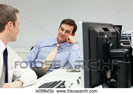Businessmen in office View Large Photo Image Stock Photograph - Businessmen in office. Fotosearch