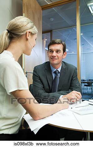 Businesspeople having duscussion View Large Photo Image Stock Image - Businesspeople having duscussion. Fotosearch