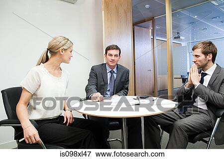 Businesspeople having duscussion View Large Photo Image Stock Photo - Businesspeople having duscussion. Fotosearch