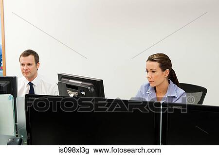 Businesspeople in office View Large Photo Image Stock Image - Businesspeople in office. Fotosearch