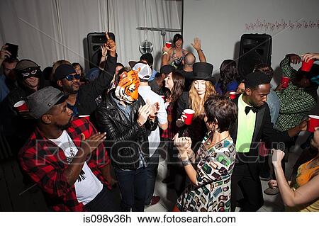 People dancing at party View Large Photo Image Stock Image - People dancing at party. Fotosearch